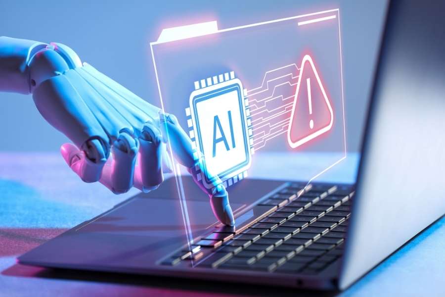 Une main robotique interagit avec le pavé tactile d'un ordinateur portable sous une interface holographique affichant les assistants virtuels intelligents.